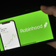 The Robinhood logo displayed on a mobile phone.